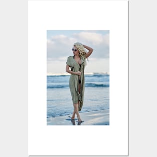 Beautiful woman on the sea shore Posters and Art